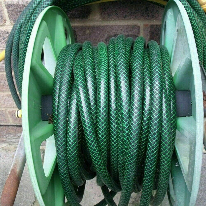 Green garden hose pipe with a length of 30 meters