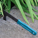 Paving stone weeder tool for removing grass, moss, and weeds between paving stones