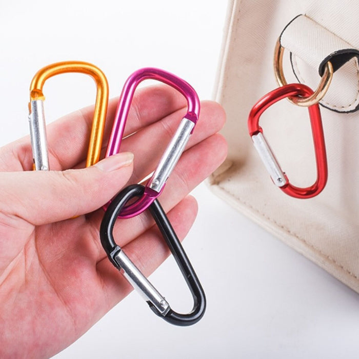 Red small carabiner designed for outdoor activities