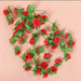 White artificial flower garland with plastic leaves